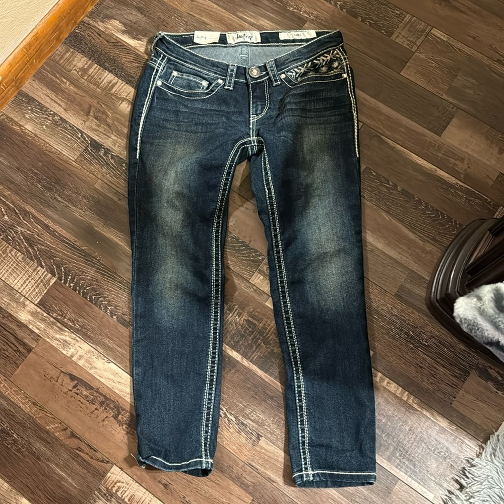 New with tags.  Daytrip slim fit, super low rise jeans.  Size 27